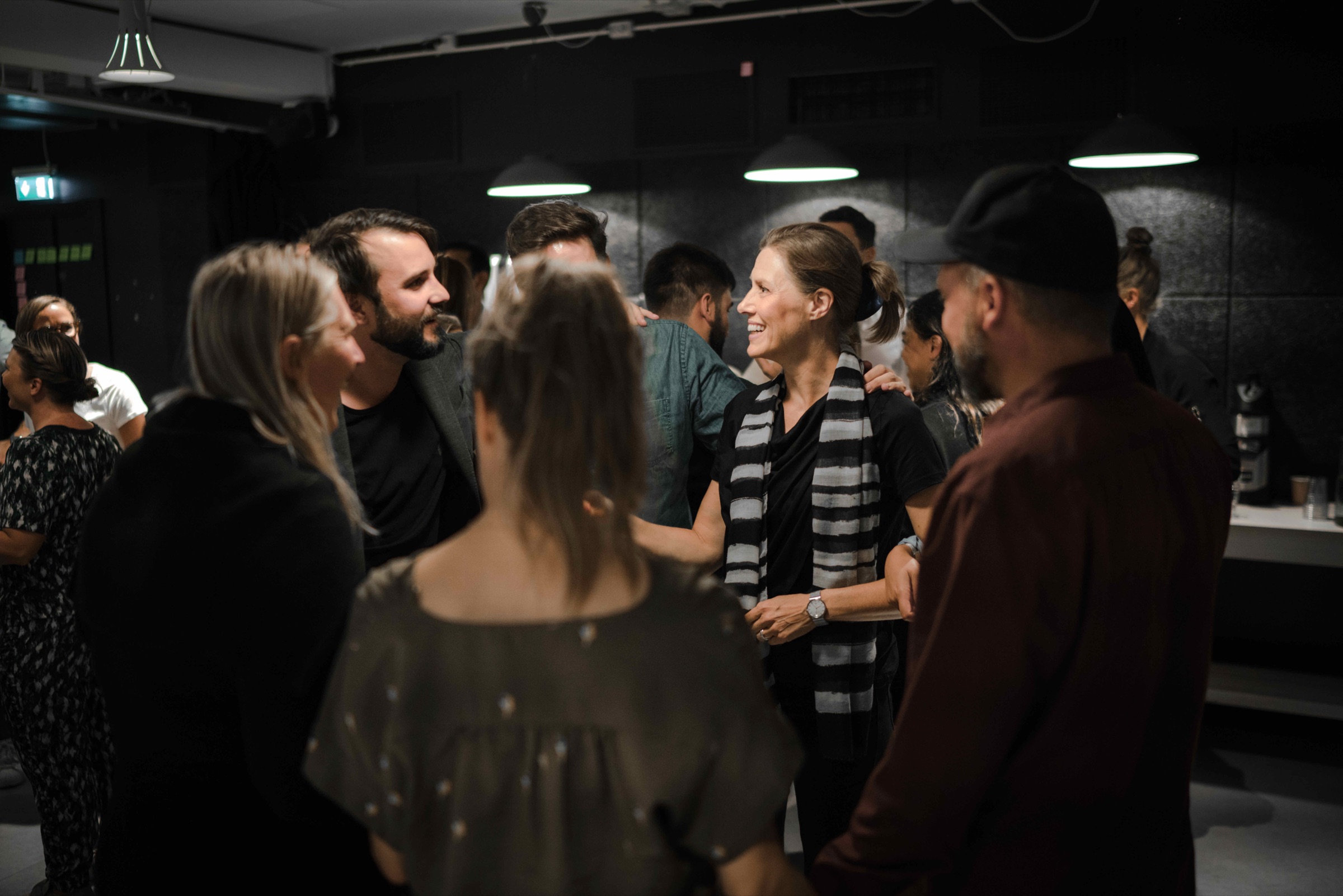 Participants in conversation after a gathering